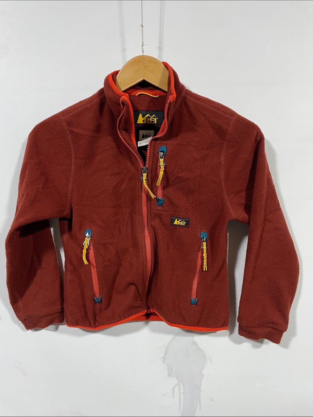 REI Kids' Rust Red Fleece Jacket with Yellow Accents